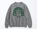 COMPASSION SWEATER